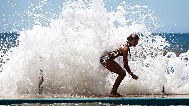 Kiahni Scott, 12, beats the heat in the water at Collaroy. Picture: Adam Yip / Manly Daily