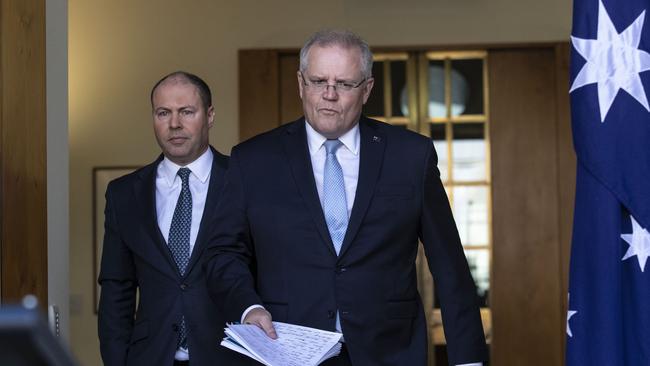 Prime Minister Scott Morrison with the Treasurer Josh Frydenberg announced an ambitious . Picture Gary Ramage