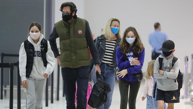 AFL CEO Gillon McLachlan and his family head to Queensland to announce the AFL Grand final will be played at the Gabba. Picture: Alex Coppel.