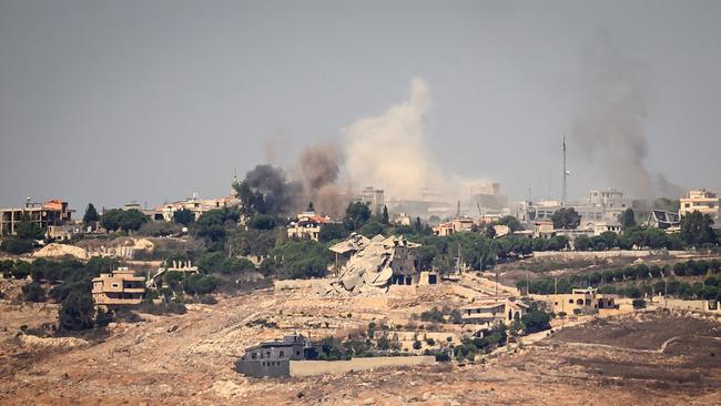 Smoke rises from a village across the border of Lebanon following a strike by the Israeli air force on October 4, in Rihaniya, Israel. Picture: Getty