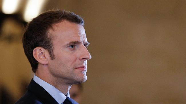 French President Emmanuel Macron attends a ceremony at the Pantheon on April 27, 2018 in Paris in tribute to the victims of French slavery in its colonies and celebrating 170 years since its abolition on April 27, 1848 by French politician Victor Schoelcher who is interred in the Pantheon's crypt. / AFP PHOTO / POOL / Thibault Camus