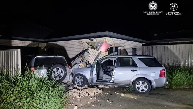 A man was arrested after his Ford Territory crashed into a house at Elizabeth Park overnight. Picture: SA Police