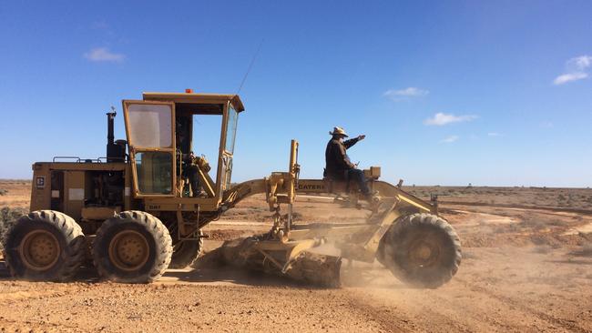 Phil Turner from the Marree Hotel re-creating the Marree Man with a tractor. Picture: Greg Dunstan