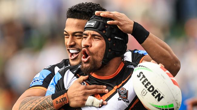 TAMWORTH, AUSTRALIA - MAY 11: Isaiah Papali'i of the Tigers celebrates a try with team mates during the round 10 NRL match between Wests Tigers and Newcastle Knights at Scully Park, on May 11, 2024, in Tamworth, Australia. (Photo by Mark Evans/Getty Images)