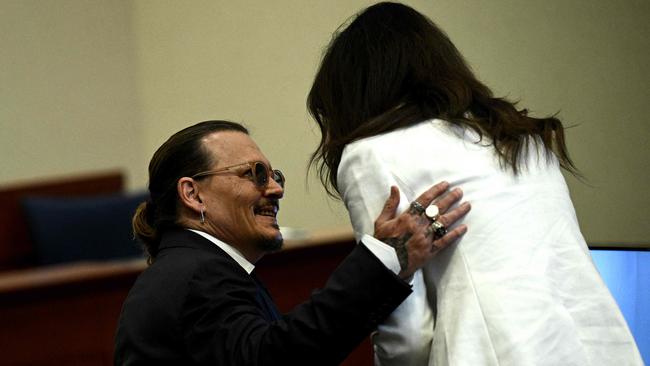 “It looks flirtatious but that’s probably the point,” she said. Picture: Steve Helber / POOL / AFP.