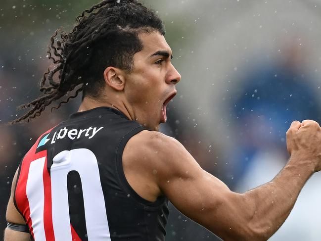 MELBOURNE, AUSTRALIA - FEBRUARY 15: Isaac Kako of the Bombers celebrates kicking a goal during the 2025 AFL Pre-Season match between Western Bulldogs and Essendon Bombers at Whitten Oval on February 15, 2025 in Melbourne, Australia. (Photo by Quinn Rooney/Getty Images)