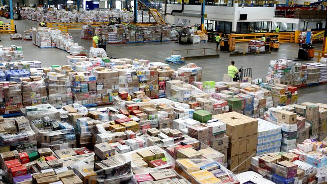 Forklifts move stock at Woolworths distribution centre at Minchinbury in Sydney’s west. Picture: Nikki Short.