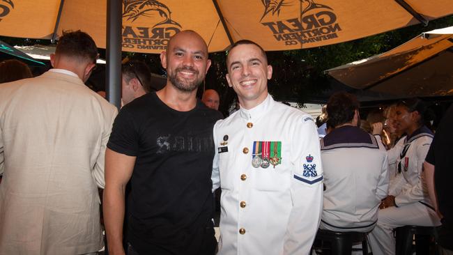 Johnn Koenig and Chris Lakerdis as ADF personnel crowd into Darwin pubs to celebrate Anzac Day. Picture: Pema Tamang Pakhrin