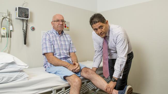 Gold Coast local Michael White is one of the 30 patients in the trial. Michael White with Gold Coast Health neurologists Associate Professor Arman Sabet. Picture: Jerad Williams