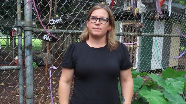 Jingili Primary School teacher Jemma Rust in front of the chook pen where 10 chickens were killed over the weekend. Picture: Bethany Griffiths