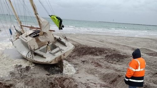 Attempting to use the tide to move the stranded vessel. Picture: Supplied