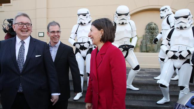 Mr Harwin (left) with Premier Gladys Berejiklian in his ministerial days. Picture: David Swift