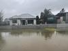 ‘We’re broken’: Residents evacuate flood hot spots
