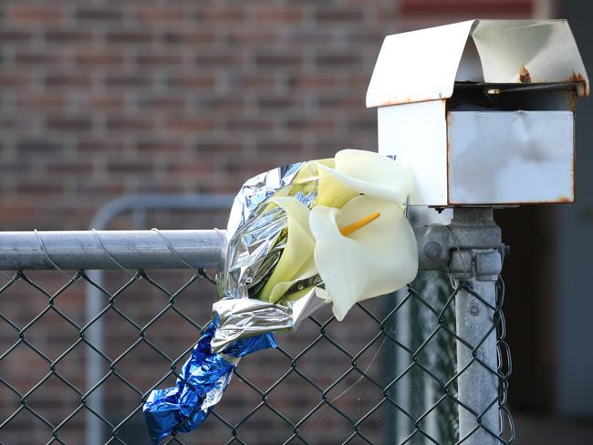 Flowers left at the Clarendon Vale house where the body of Michelle Louise Meades was found. Picture: NIKKI DAVIS-JONES