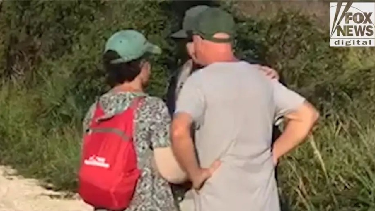 Brian Laundrie’s parents speaking to an officer. Picture: Fox News