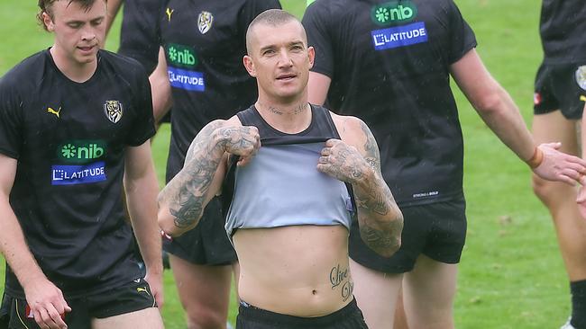 Richmond FC training at Punt Rd oval. Dustin Martin changes his top. Picture: Ian Currie