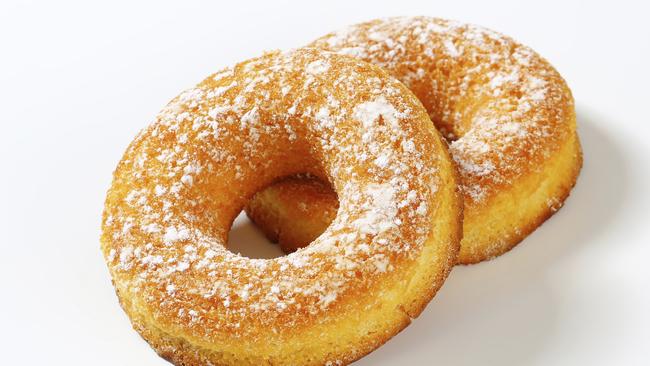 TASTE MATT PRESTON:  two fresh donuts isolated on white background