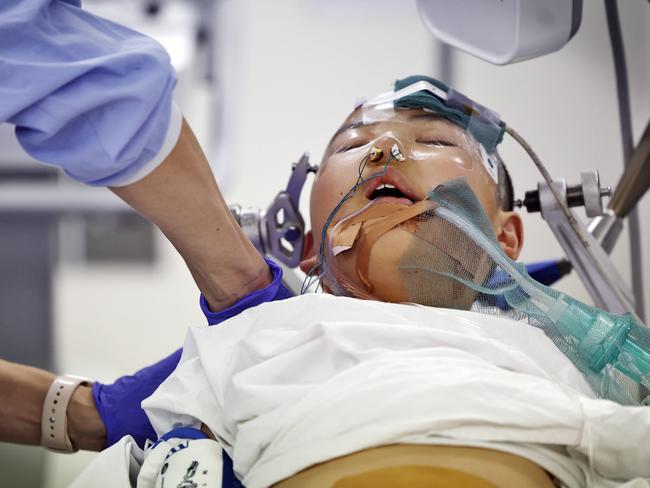 Eight-year-old Issac Lee is put to sleep and prepped for surgery. Picture: Sam Ruttyn