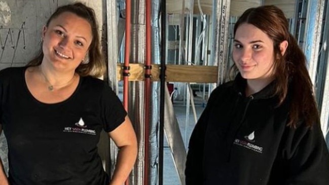 Kimberley Smyth, left, and daughter Lara Smyth, right, at work for Hey Sista Plumbing. Picture: Supplied.