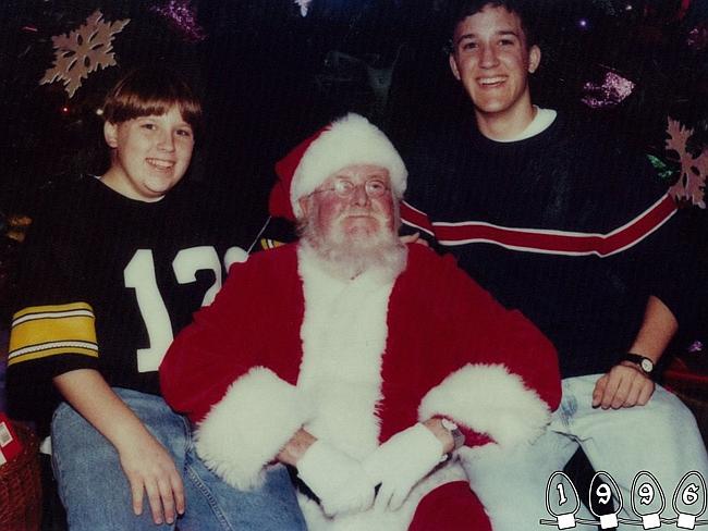 1996 ... Clearly too big for Santa's lap now, Mike and Martin find a way to make the photo happen. Picture: ...