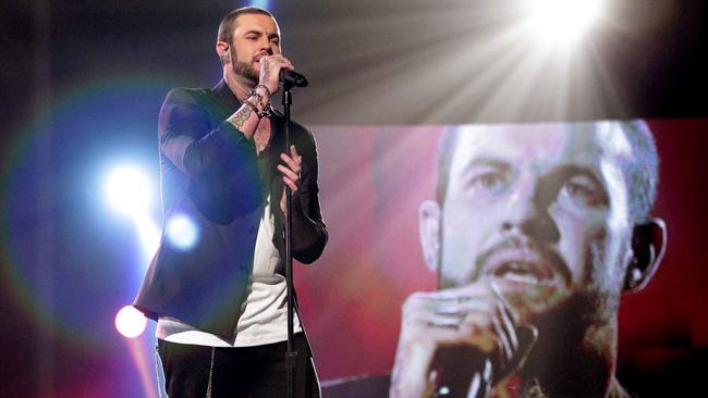 Contestant Mitchell Callaway performs on stage during the 2011 season of the Channel 7 TV program X Factor Australia.