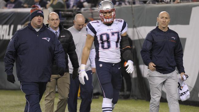 New England Patriots tight end Rob Gronkowski (87) walks off the field with an injury during the second quarter of an NFL football game against the New York Jets.