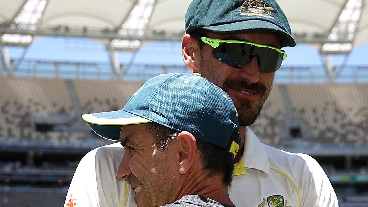 Justin Langer and Mitchell Starc when Australia played India in Perth in 2018. Picture: Ryan Pierse/Getty Images