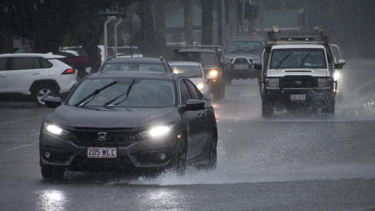 Heavy rain falling in Lannercost St in the Ingham CBD on Tuesday as a moderate flood warning was issued for the Herbert River. Picture: Cameron Bates