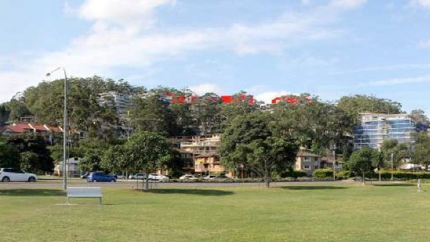 Image showing the visual impact of the buildings (in red on the ridgeline) when seen from Gosford waterfront.