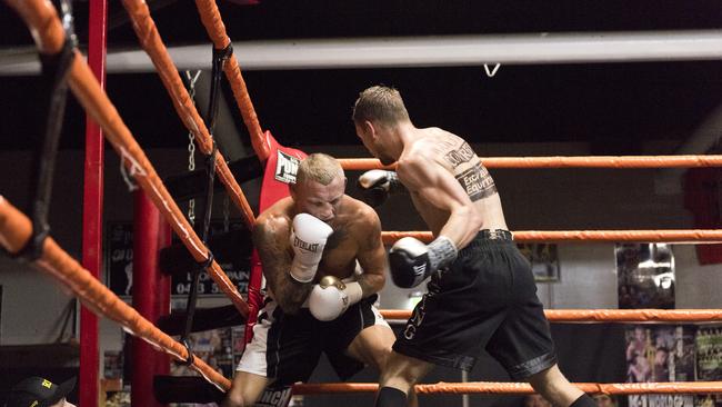 Steve Spark (right) fights Mick Whitehead as part of Locked Down Lights Up at Smithys TGW Gym, Saturday, July 11, 2020. Picture: Kevin Farmer