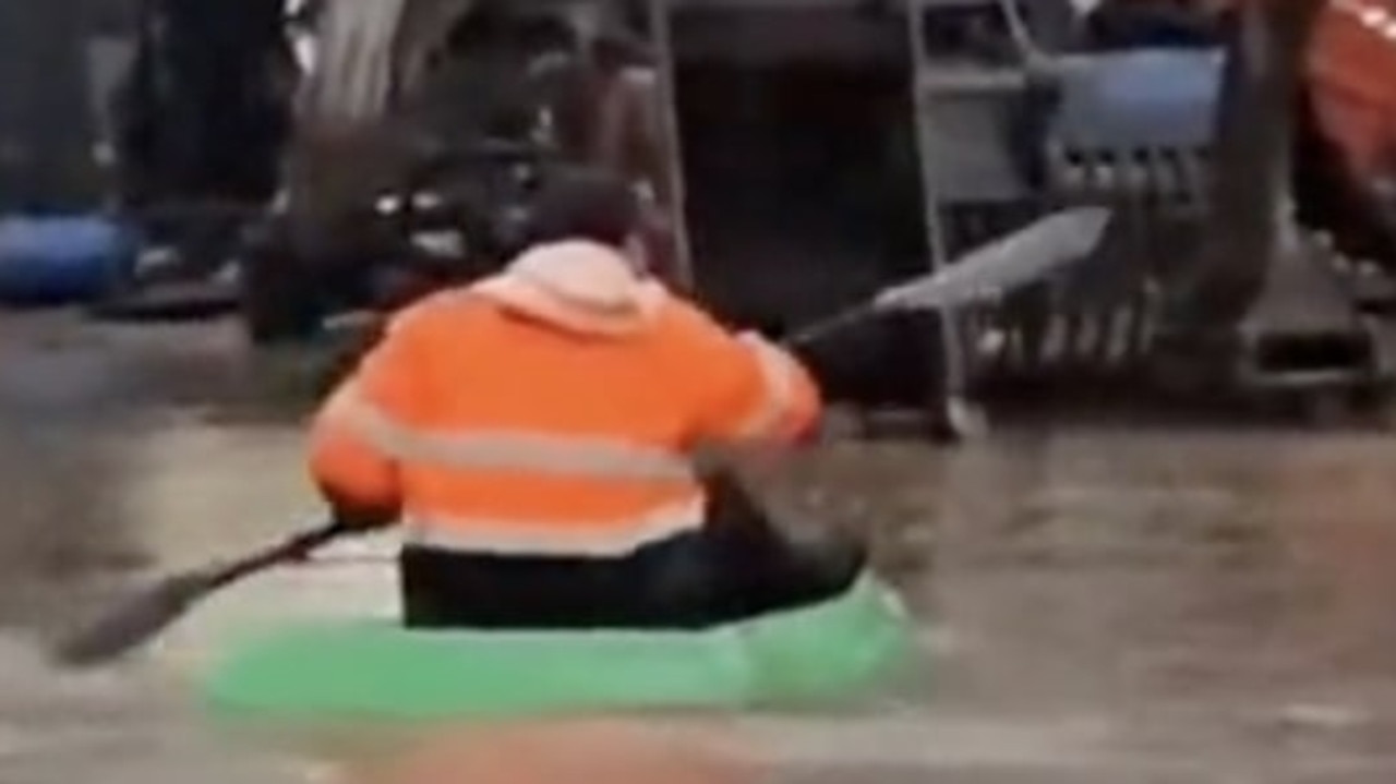 One man was seen making the most of the wet weather, travelling in a kayak down a street. Picture: TikTok