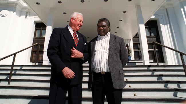 Prime minister Gough Whitlam with Yunupingu on the steps of Old Parliament House.