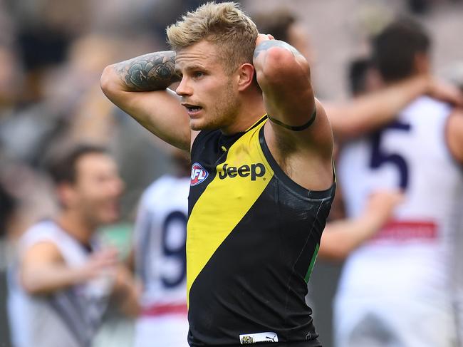 Brandon Ellis of the Tigers reacts after the Round 8 AFL match between the Richmond Tigers and the Fremantle Dockers at the MCG in Melbourne, Sunday, May 14, 2017. (AAP Image/Julian Smith) NO ARCHIVING, EDITORIAL USE ONLY