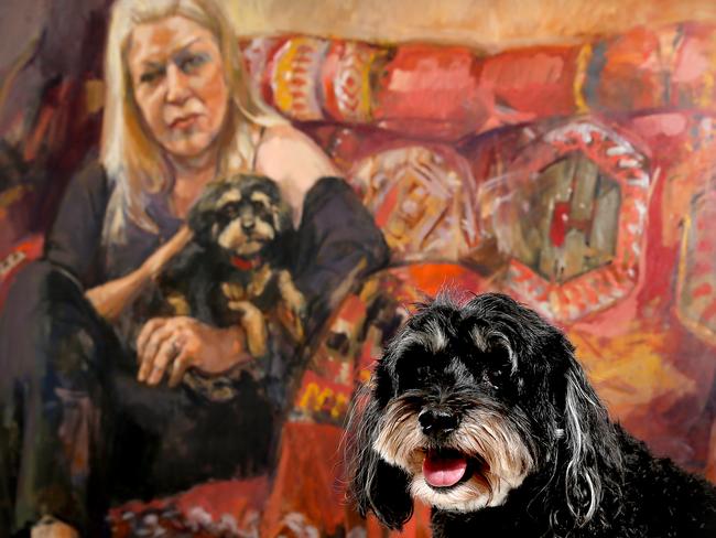 Chilli in front of a portrait of Kerrie Lester at the Mosman Art Gallery.