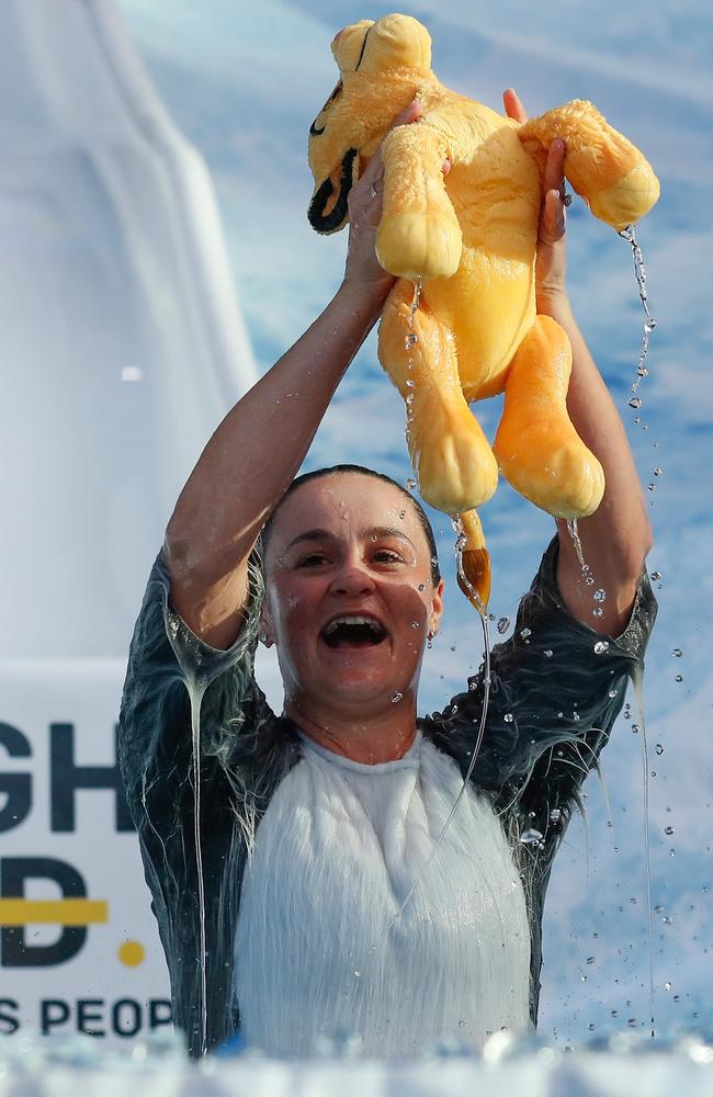 But emerged with a smile on her face — and Simba. Picture: Getty Images