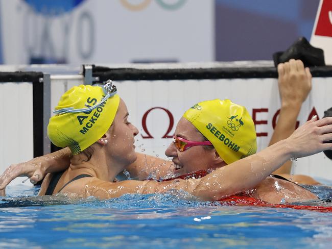 Kaylee McKeown and Emily Seebohm embrace after winning gold and bronze in Tokyo. Picture: Alex Coppel.