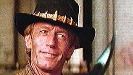 'Crocodile Dundee' actor Paul Hogan PICT SUPPLIED . headshot film scene movies hunting knife bowie ? hat