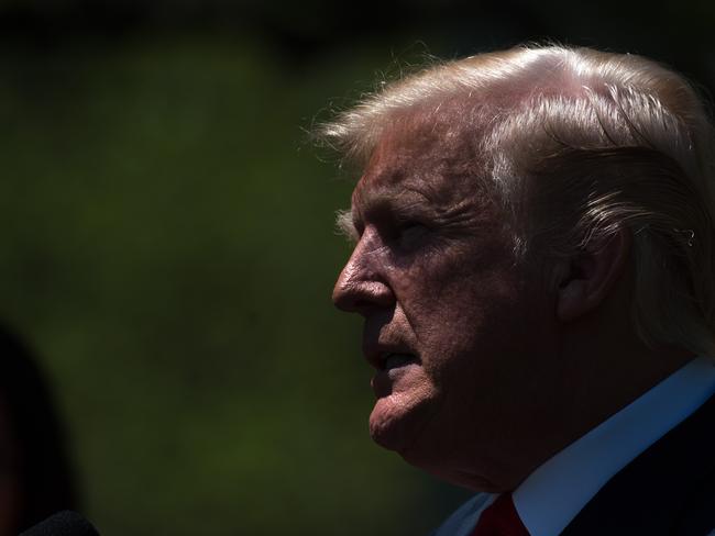 US President Donald Trump speaks at the National Day of Prayer ceremony in the Rose Garden of the White House in Washington, DC, May 3, 2018. / AFP PHOTO / SAUL LOEB