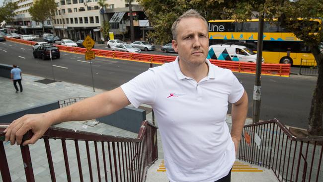 Chris Quinn, owner of ExaGym in Cremorne, is annoyed about works on Military Rd for the B-Line. Picture: Julian Andrews.