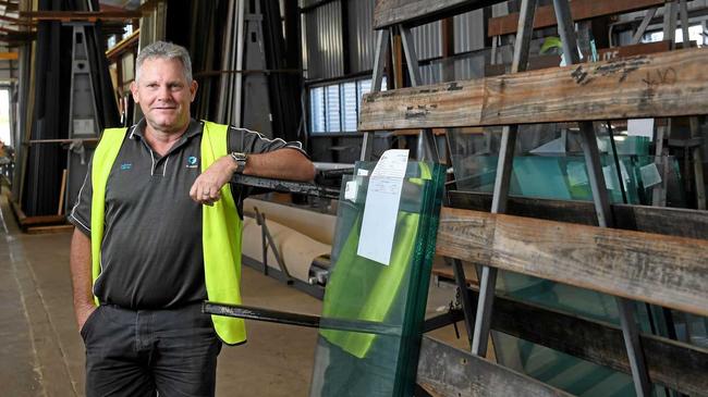 PROUD: Steve Jones was one of the glaziers from G. James who replaced the glass in the Ipswich post office clock tower after the heat from the Reids fire melted the clockface in 1985. Picture: Rob Williams