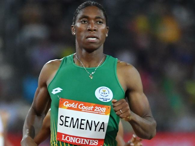 South Africa's Caster Semenya competes in the athletics women's 1500m heats during the 2018 Gold Coast Commonwealth Games at the Carrara Stadium on the Gold Coast on April 9, 2018. / AFP PHOTO / SAEED KHAN