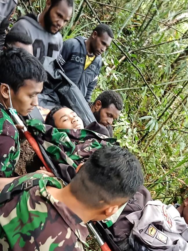 Jumaidi is rescued yesterday. Picture: AFP