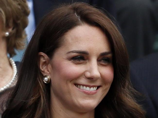 Britain's Kate, the Duchess of Cambridge smiles in the Royal Box on the opening day at the Wimbledon Tennis Championships in London Monday, July 3, 2017. (AP Photo/Kirsty Wigglesworth)