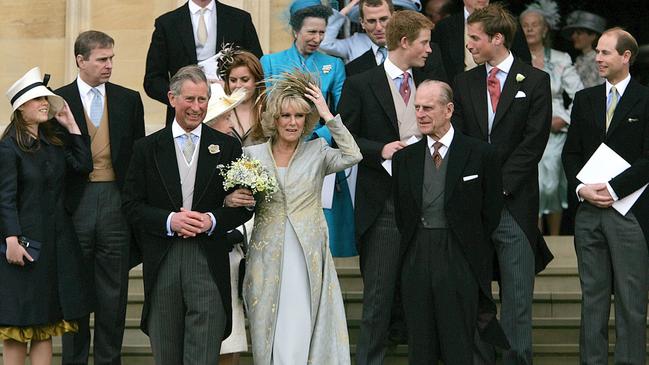 The wedding of Prince Charles with Camilla Parker Bowles. (Front l-r) Prince Charles with Duchess of Cornwall and Prince Philip Duke of Edinburgh after marriage blessing service of prayer and dedication at Saint George's Chapel at Windsor Castle 09 Apr 2005. Members of British royal family standing behind Prince Charles (l-r) Princess Eugenie, Prince Andrew, Princess Beatrice, Princess Anne, Peter Phillips, Prince Harry, Prince William and Prince Edward, Earl of Wessex.