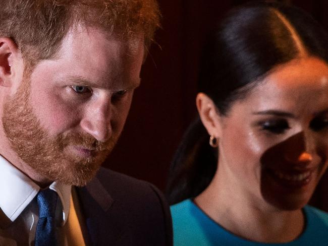 Britain's Prince Harry, Duke of Sussex (L), and Meghan, Duchess of Sussex have confirmed to Queen Elizabeth II that they will not return as working royals, Buckingham Palace announced. Picture: AFP