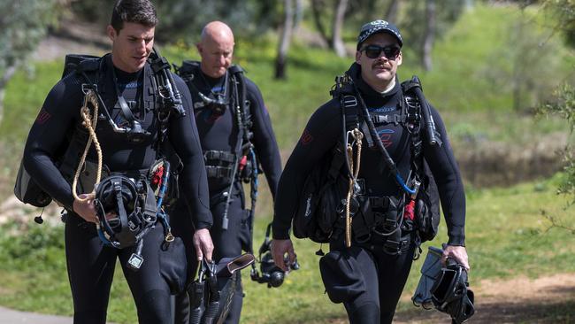 SA police divers at the operation at Stebonheath Park in Andrews Farm searching for missing person Geoffrey McLean. Picture: Naomi Jellicoe