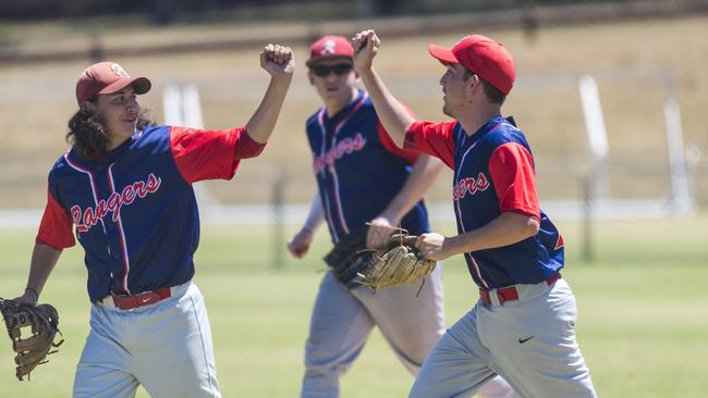 Toowoomba Rangers players Cody Luchterhand (left) and Brent Locke celebrate getting Mt Gravatt Eagles out in GBL division five baseball at Commonwealth Oval, Sunday, November 29, 2020. Picture: Kevin Farmer