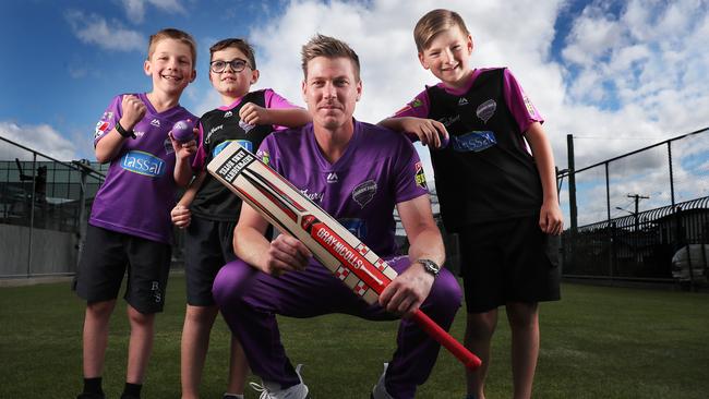 Hurricanes all rounder James Faulkner with Oliver Meers, 8, Lockie Tuckett, 9, and Nate Debnam, 7. Picture: NIKKI DAVIS-JONES