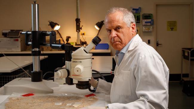 SAWeekend of Prof Chris Pearman, retiring director of Forensic Science SA on November 15, 2020.  Prof Pearman is holding the pyjama top worn by Louise Bell when she was abducted in 1983.  in Adelaide. Picture Matt Turner.