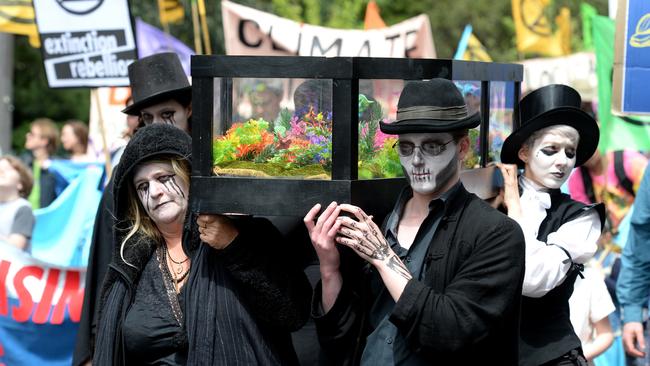 Extinction Rebellion supporters marched through the streets of Melbourne. Picture: Andrew Henshaw